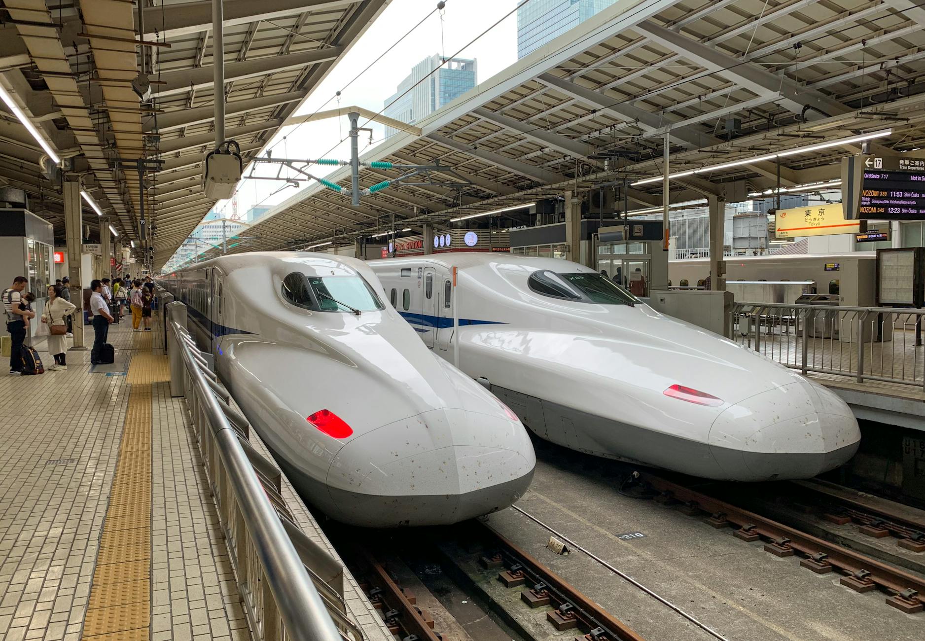 Shinkansen bullet train at Tokyo Station platform during Golden Week Japan